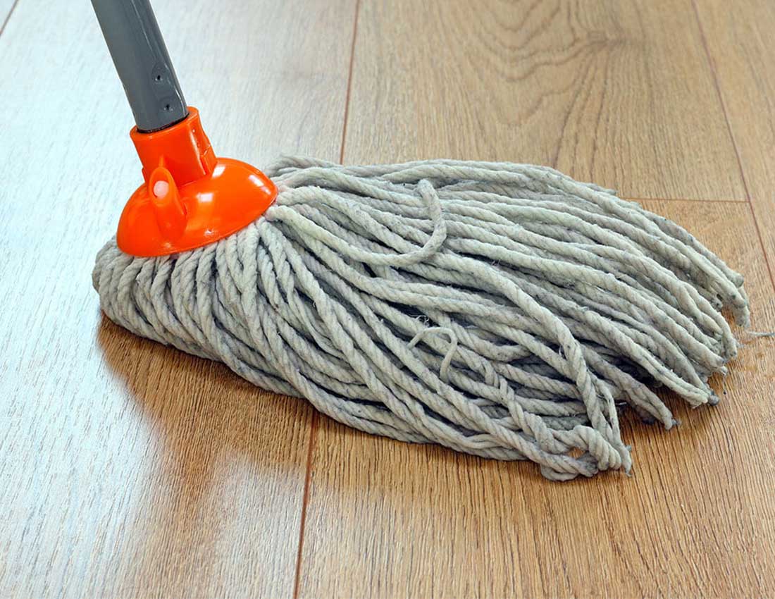 Hardwood sweeping | Carpet House Flooring Center